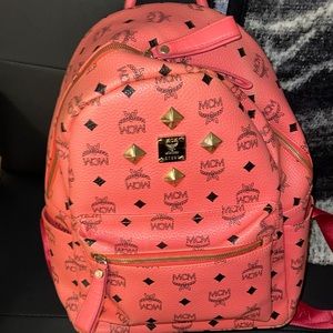 Mcm pink mini backpack. Want gone fast.